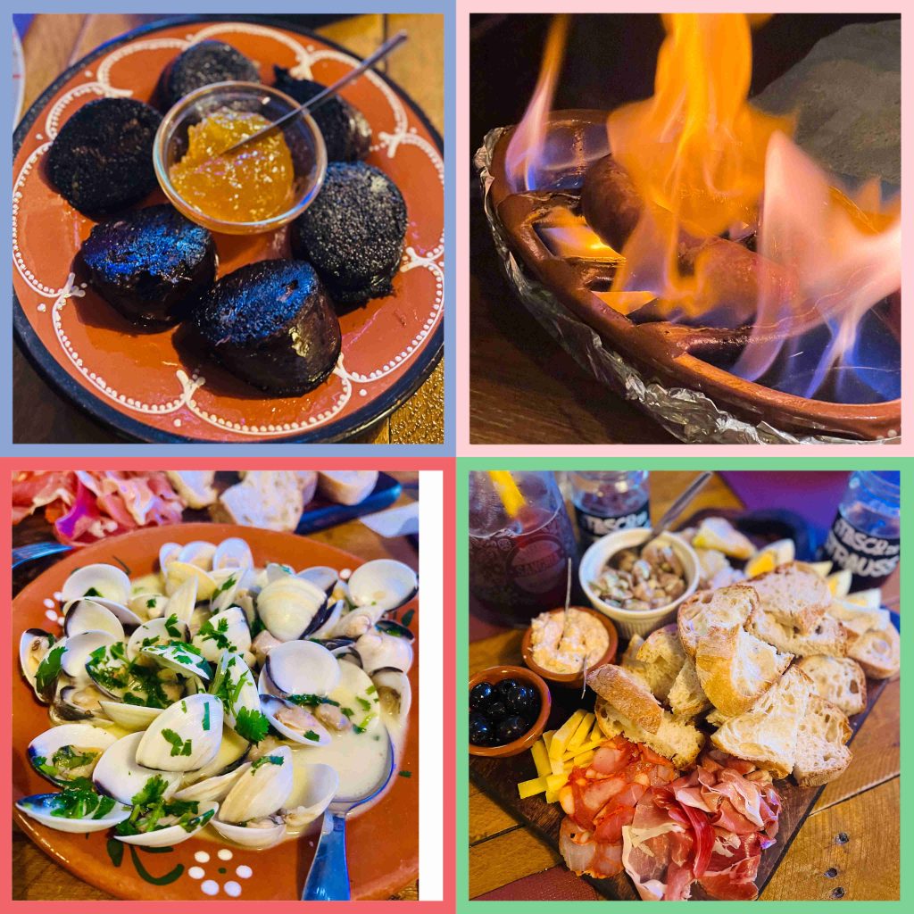 A selection of traditional Portuguese dishes, including house board, clams (meijoas), and grilled sausage, showcasing the authentic flavors of Sintra and the Pena Palace region